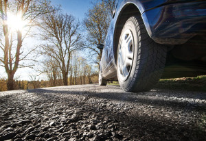 38424650 - car on asphalt road in spring morning