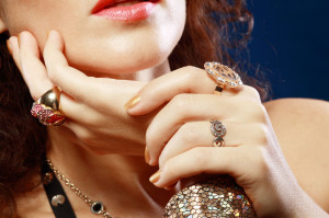 35277412 - woman with luxury jewelry hands close up