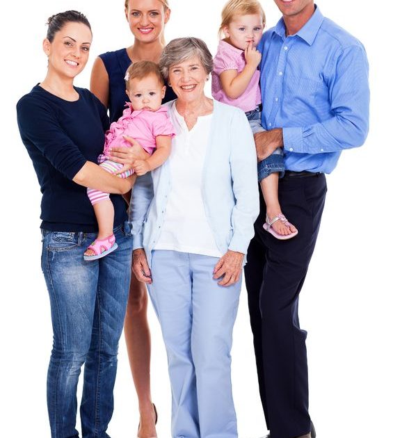 A family standing posing for a picture - Manning Insurance Services