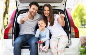 A family is hanging out in the back of their car - Manning Insurance Services.
